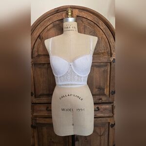 Under-wire bra. Very pretty and never worn lace bra.